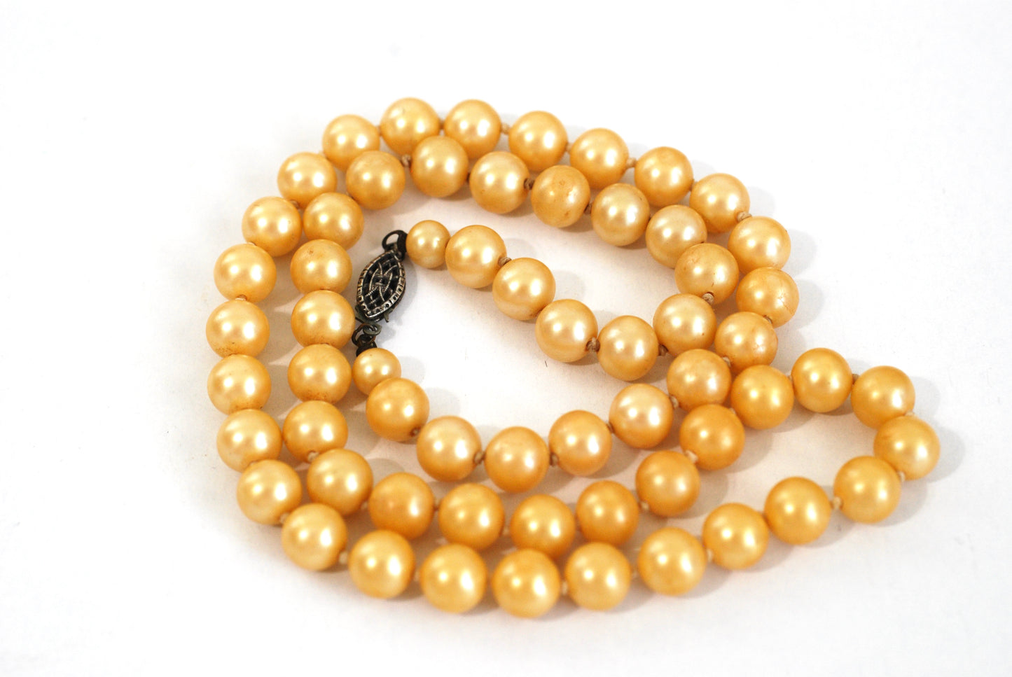 Single Strand Champagne Pearls w/Sterling Clasp