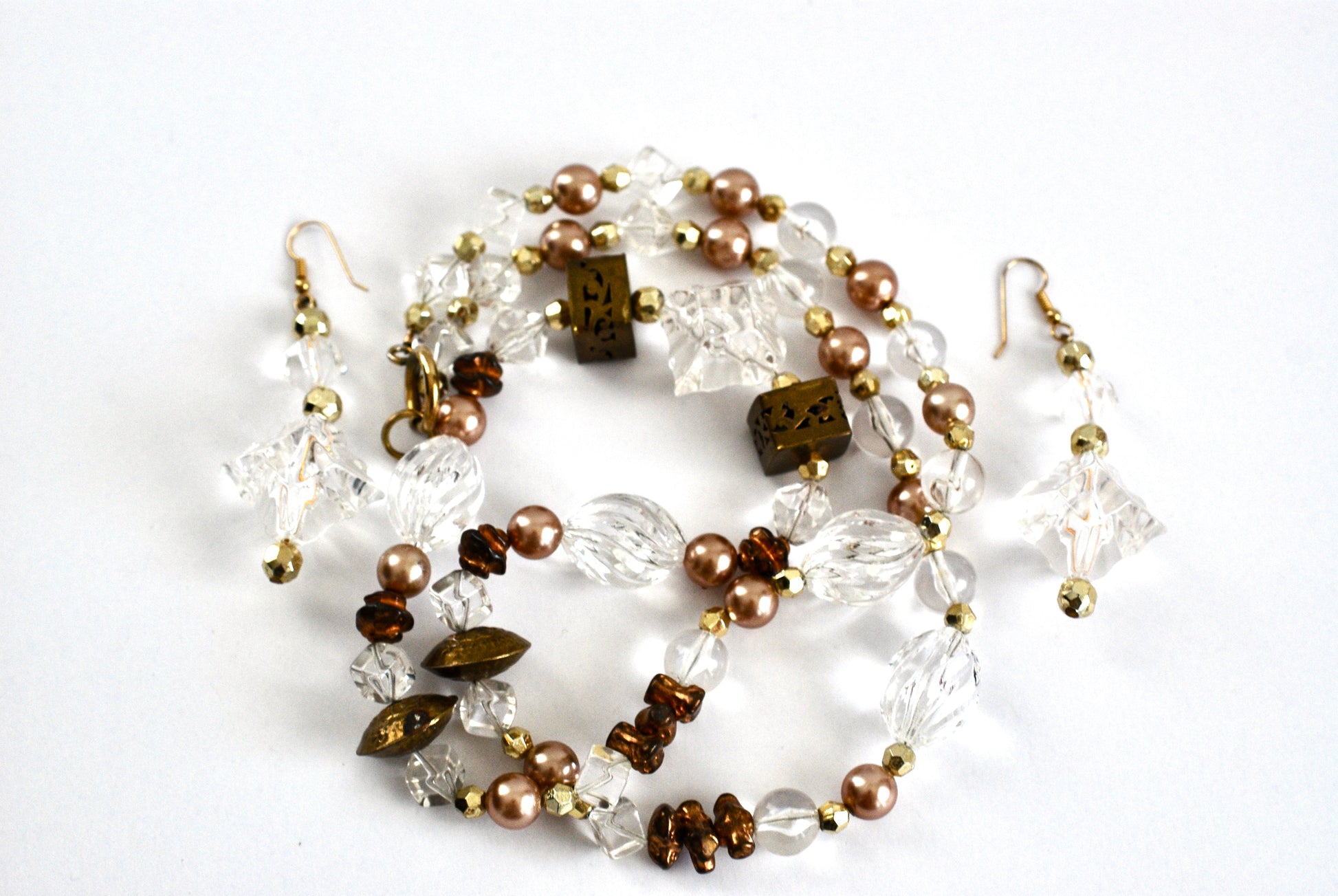 Long Boho Style Necklace and Earrings in Clear, Brass, and Pearls