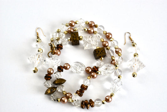 Long Boho Style Necklace and Earrings in Clear, Brass, and Pearls
