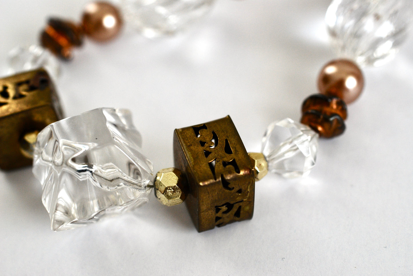 Long Boho Style Necklace and Earrings in Clear, Brass, and Pearls