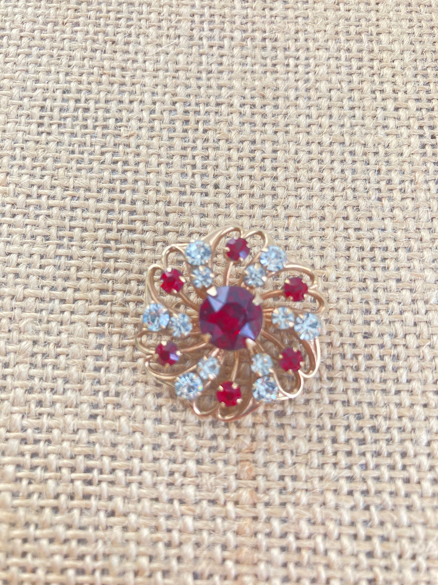 1950s Red and White Rhinestone Starburst Swirl Brooch