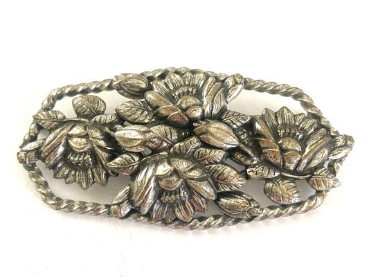 Large Floral Brooch in Silver Repousse