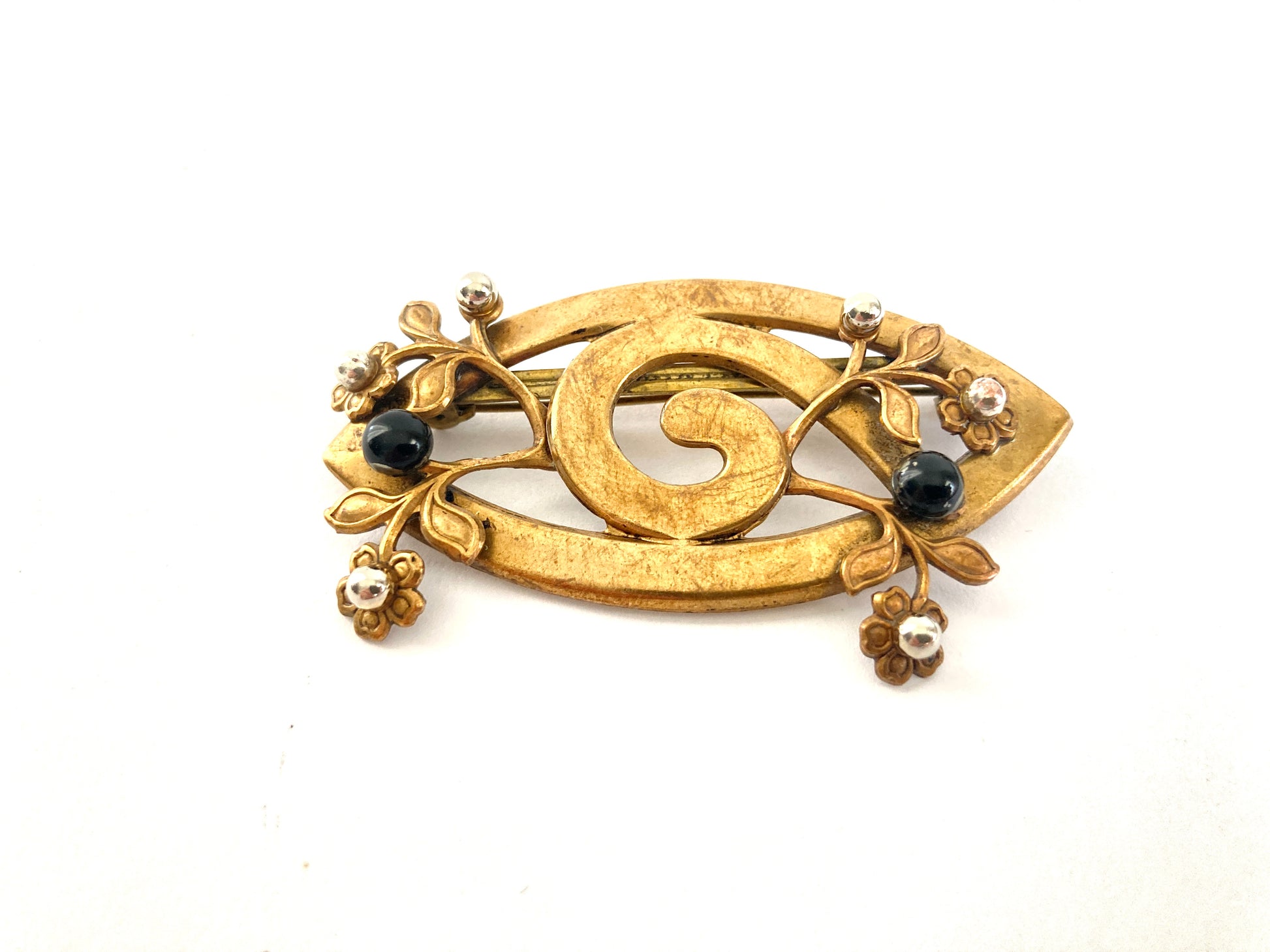 Antique stamped brass brooch with flowers