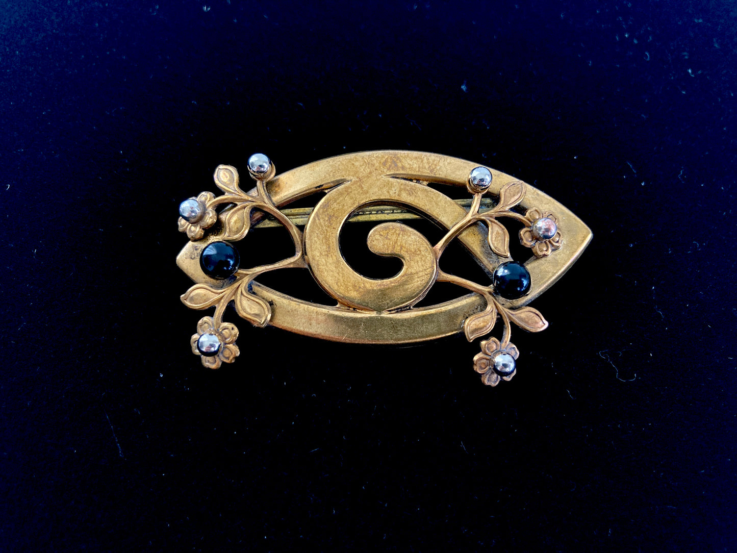 Antique stamped brass brooch with flowers