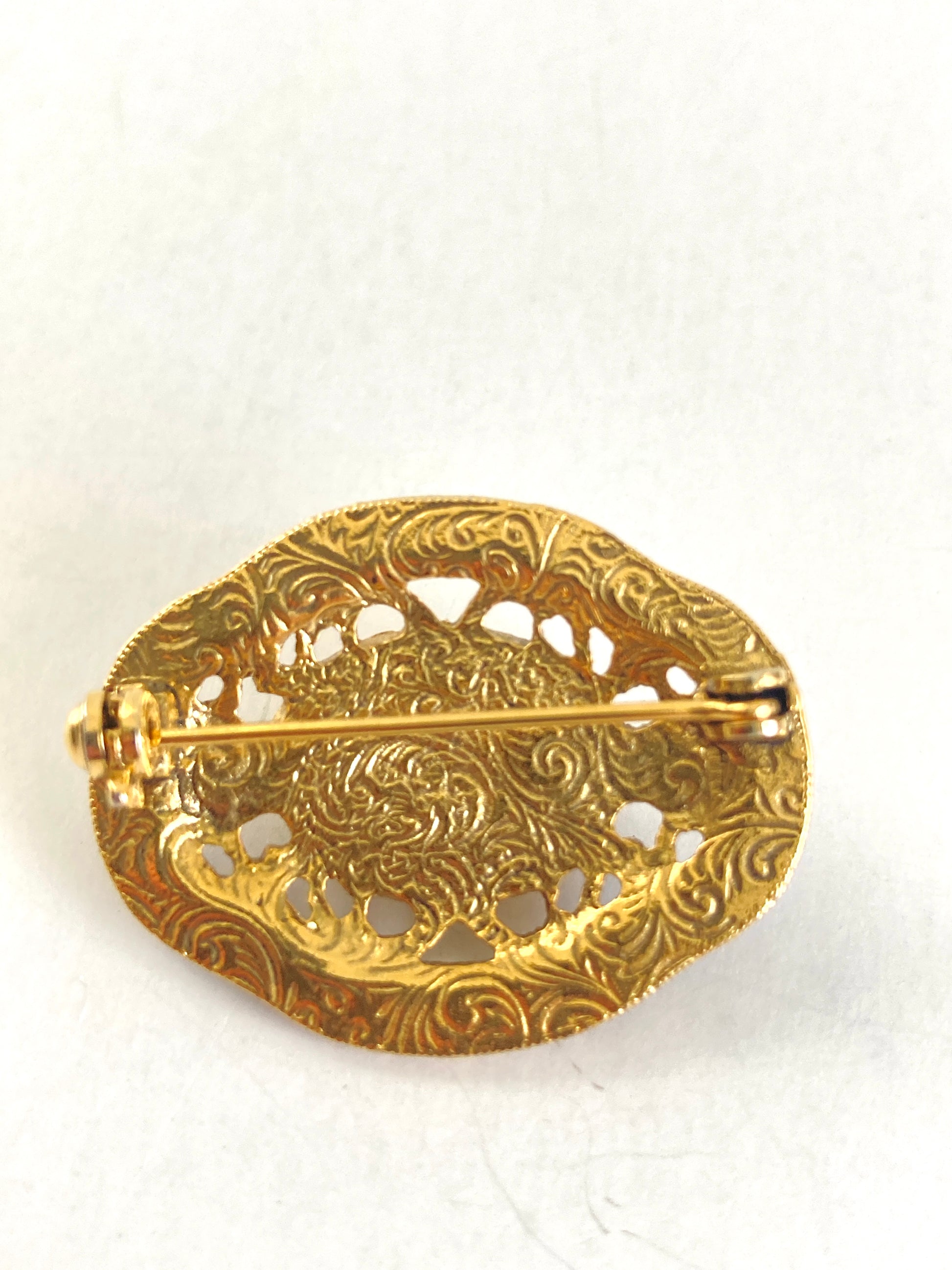 Oval Goldtone and Black Enamel Brooch