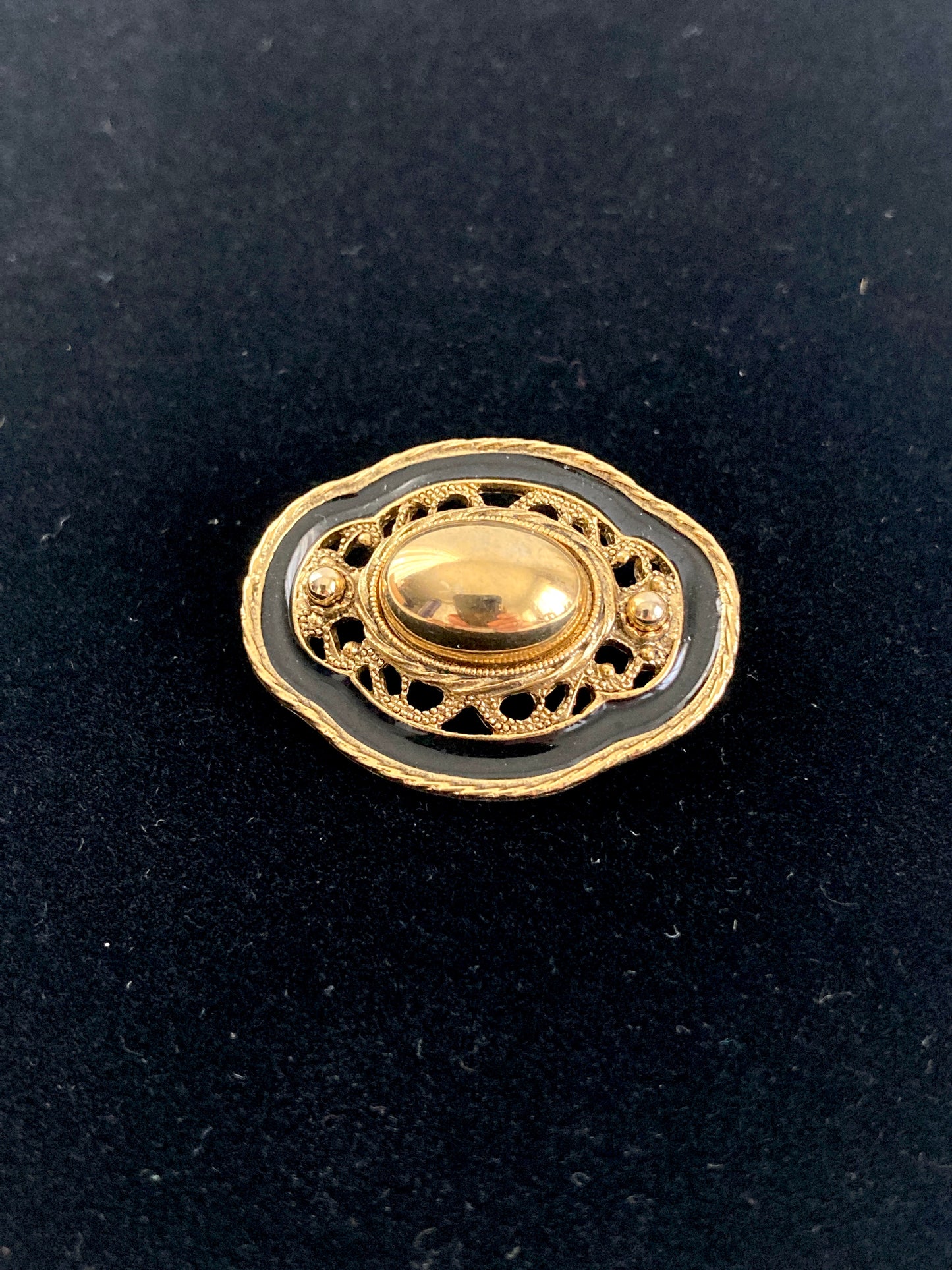 Oval Goldtone and Black Enamel Brooch