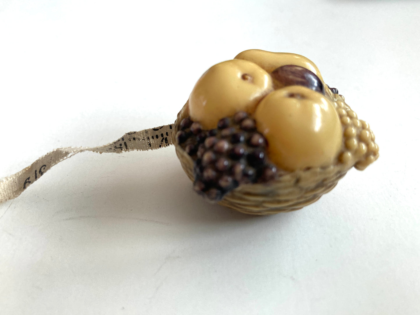 Antique Sewing Tape Measure Celluloid Basket of Fruit