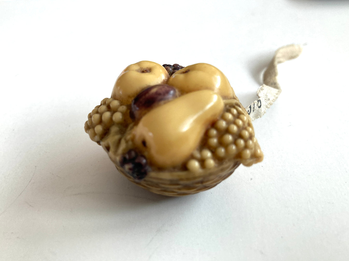 Antique Sewing Tape Measure Celluloid Basket of Fruit