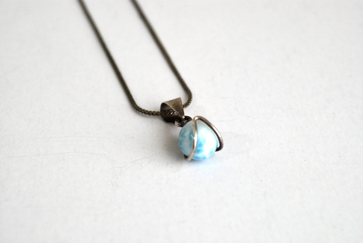 Larimar Ball Pendant in Sterling Silver Setting on Serpentine Chain