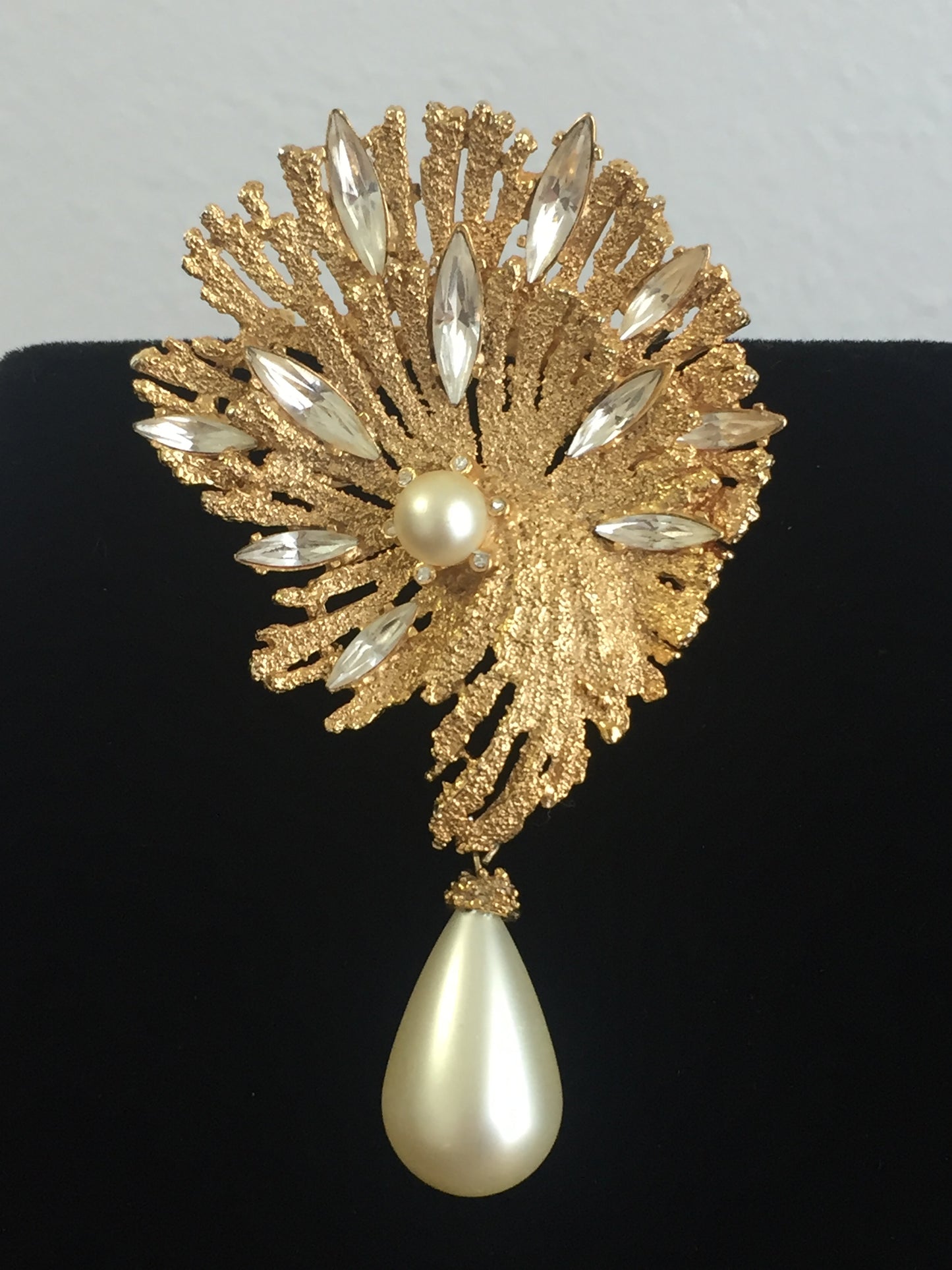 Vintage gold tone crystal navette and pearl teardrop brooch