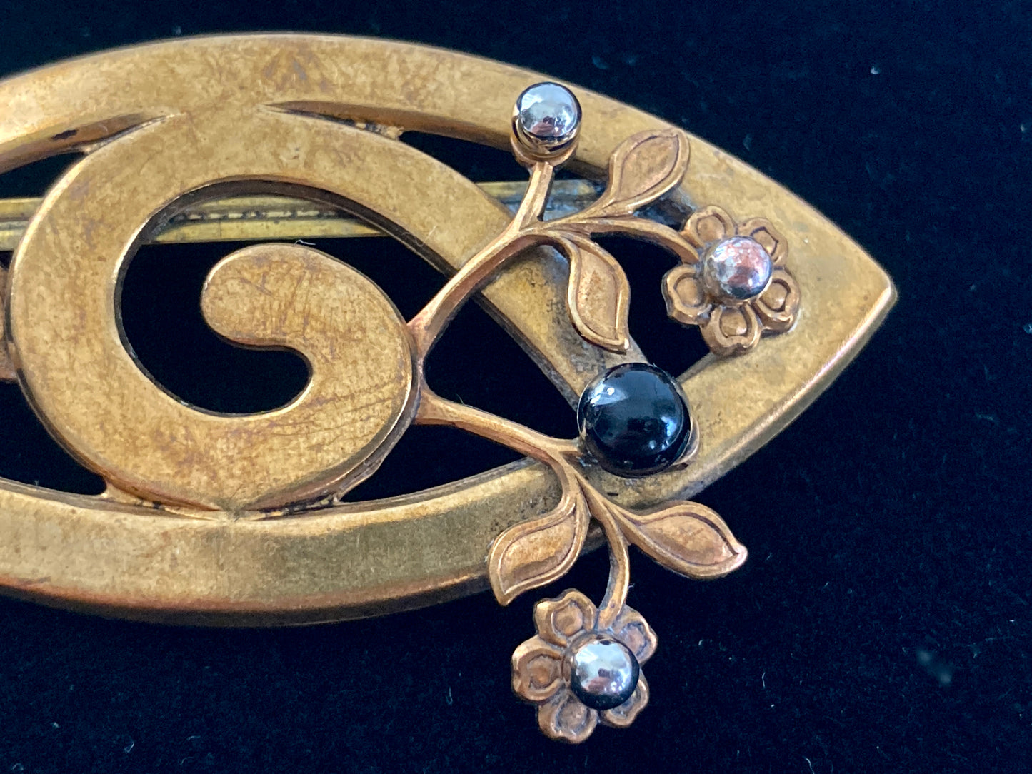 Antique stamped brass brooch with flowers