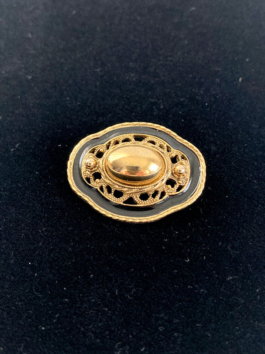 Oval Goldtone and Black Enamel Brooch